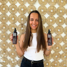 scalp duo person holding the products